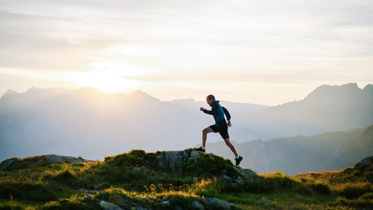 man climbing outdoors