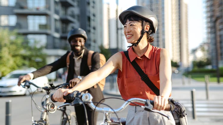Two persons cycling